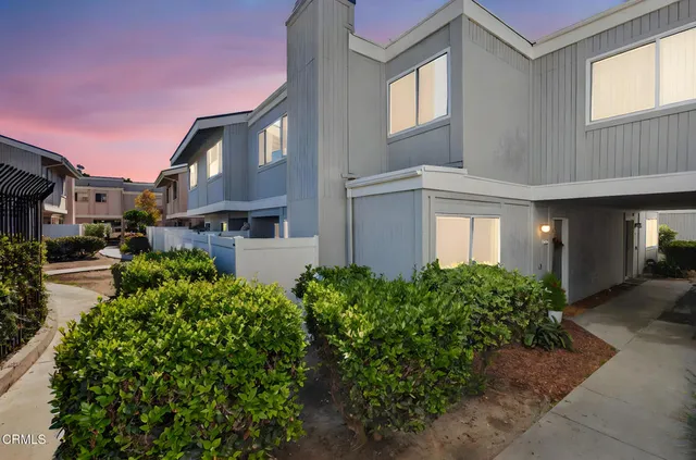 a front view of a house with a porch
