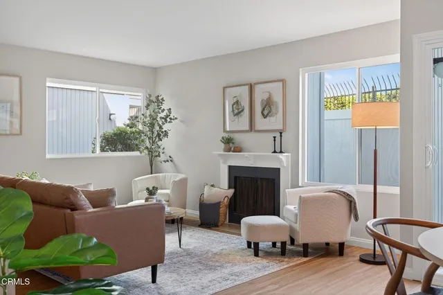 a kitchen with stainless steel appliances granite countertop a stove a refrigerator and a sink