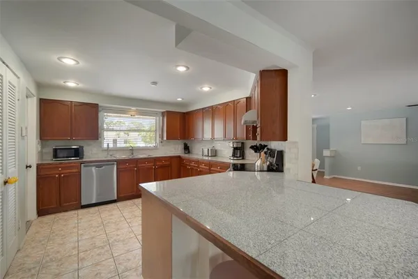 a view of a swimming pool with a patio