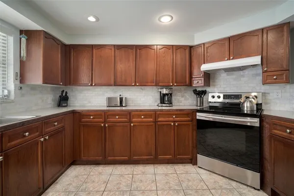 a view of a chairs and tables in patio