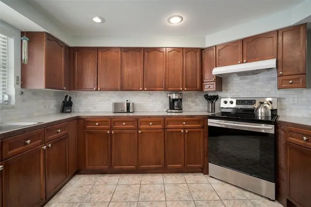 a view of a chairs and tables in patio