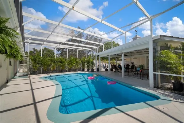 a view of room with furniture and a gate