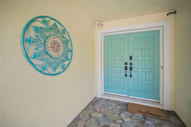 a living room with fireplace and a fireplace