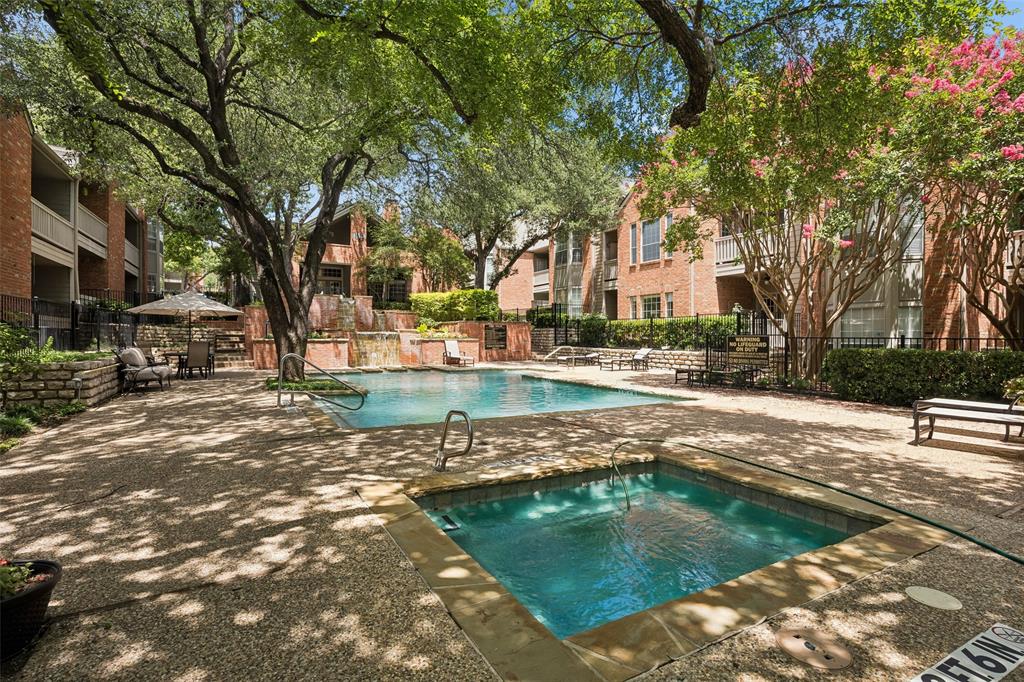 12660 Hillcrest Road, Unit 7205 Dallas, TX 75230 - Photo 24 of 25 Outdoor amenity area featuring two distinct pools with surrounding concrete decking
