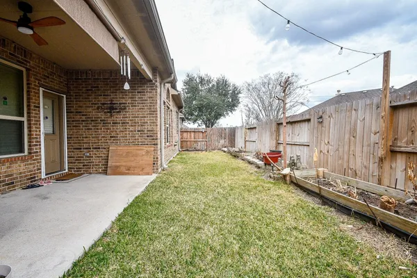 a view of backyard of house