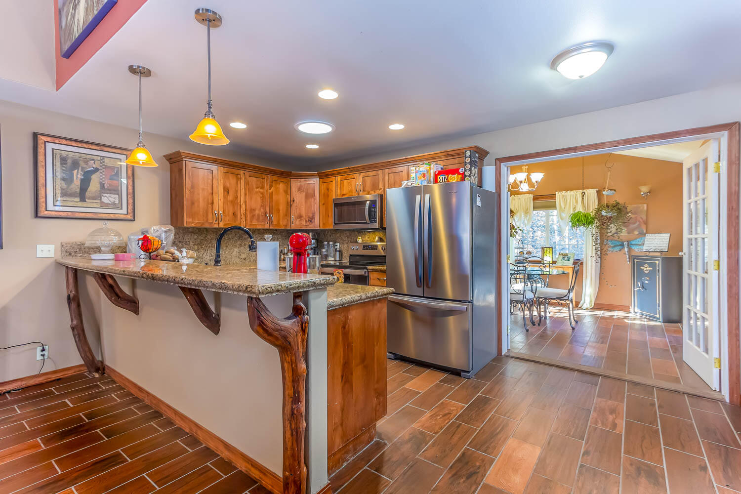 53345 Andrews Road La Pine, OR 97739 - Photo 19 of 42 Upper level Kitchen view looking into dining room.