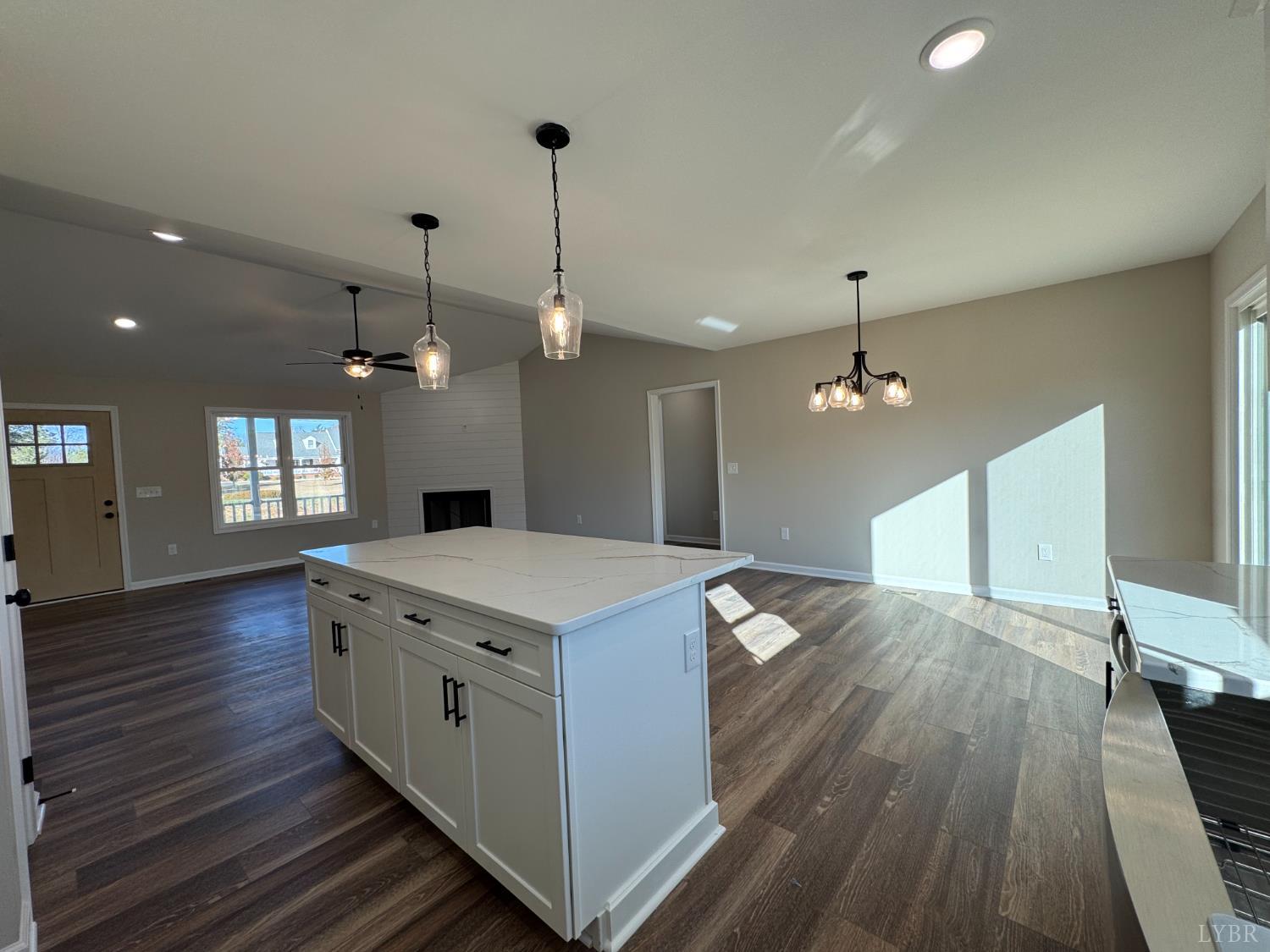 554 Stratford Road Concord, VA 24538 - Photo 3 of 19 a kitchen that has a lot of white cabinets and wooden floor