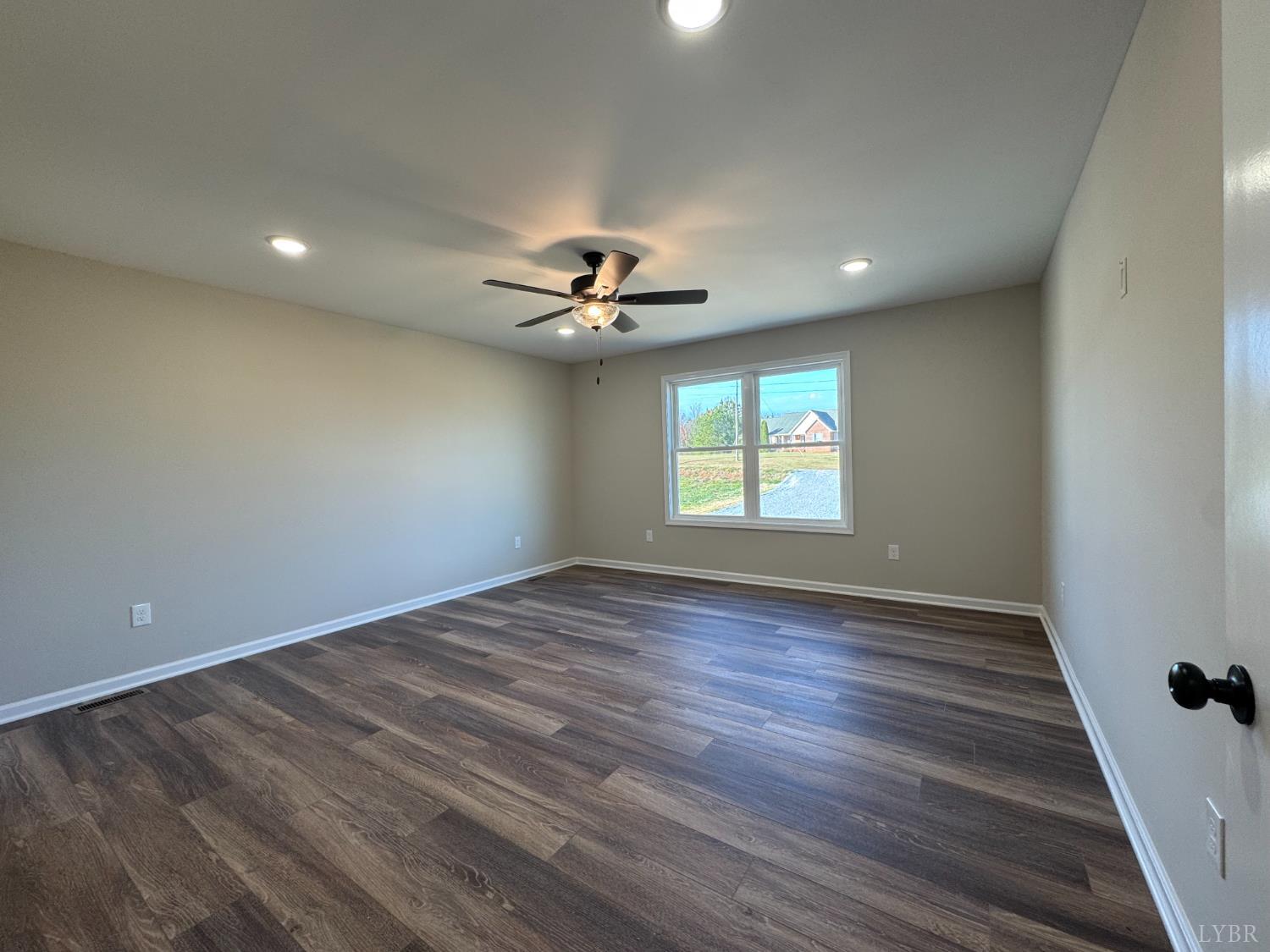 554 Stratford Road Concord, VA 24538 - Photo 7 of 19 wooden floor in an empty room with a window