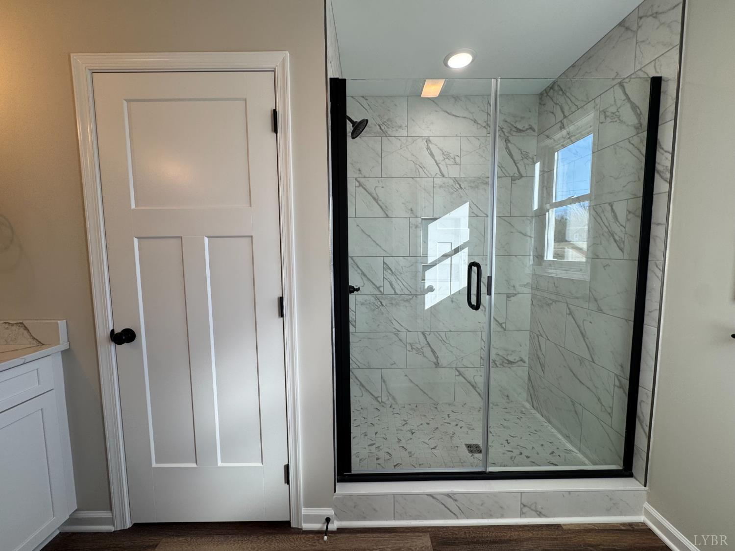 554 Stratford Road Concord, VA 24538 - Photo 10 of 19 a view of a bathroom that has a glass shower door