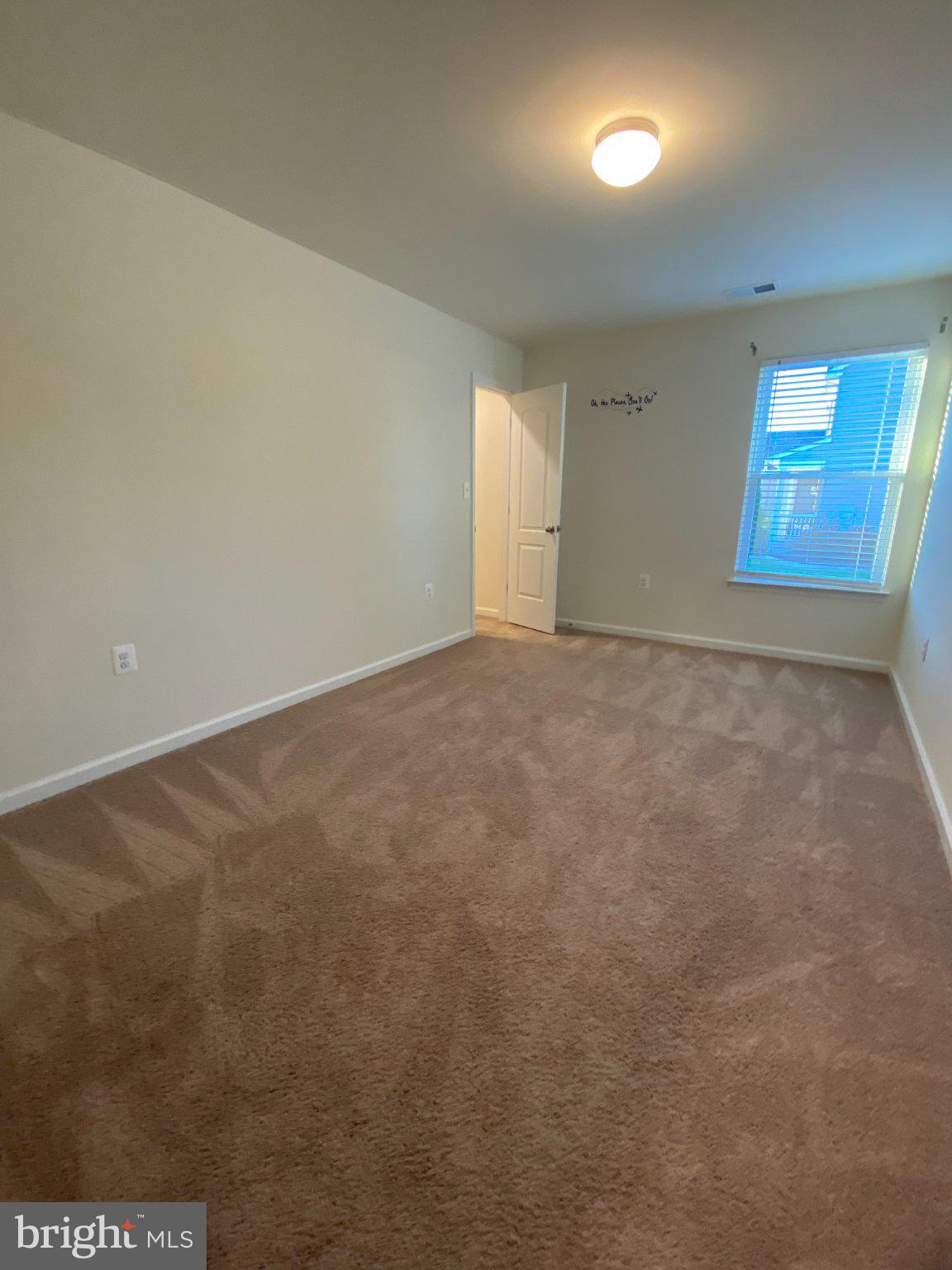 697 Rivanna Run Falling Waters, WV 25419 - Photo 39 of 44 an empty room with windows