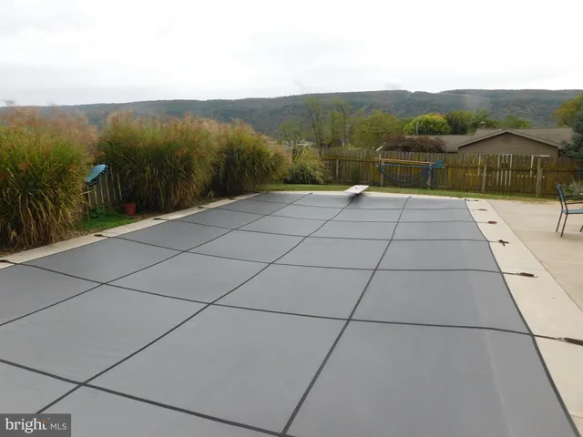 a view of terrace with view of lake