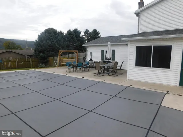 a bench sitting in front of a building