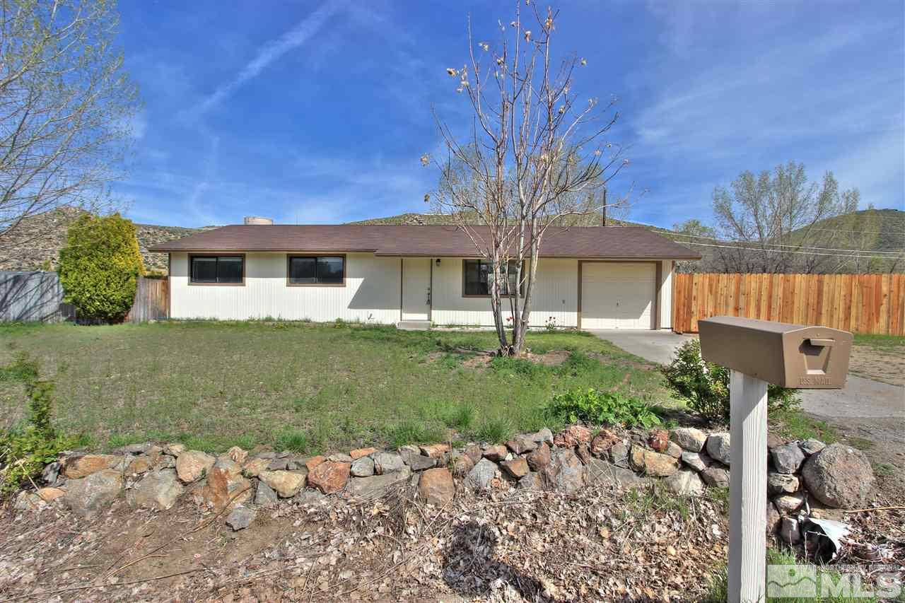 9070 Turbine Way Reno, NV 89506 - Photo 1 of 1 a front view of a house with garden