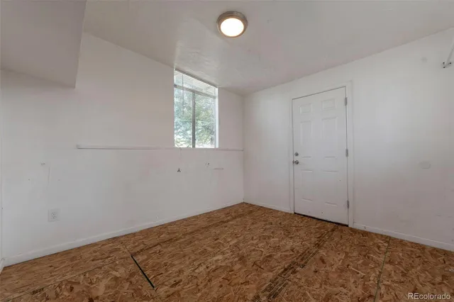 a view of a room with a window