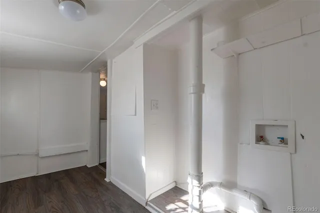 a view of a livingroom with wooden floor
