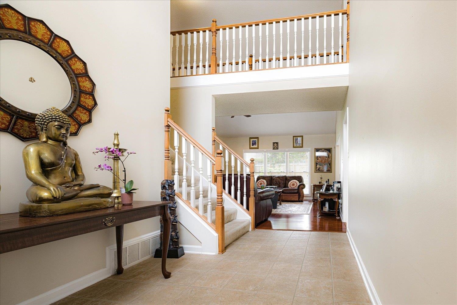9163 Roundabout Lane Memphis, TN 38018 - Photo 3 of 24 Tiled foyer entrance featuring stairs and a high ceiling