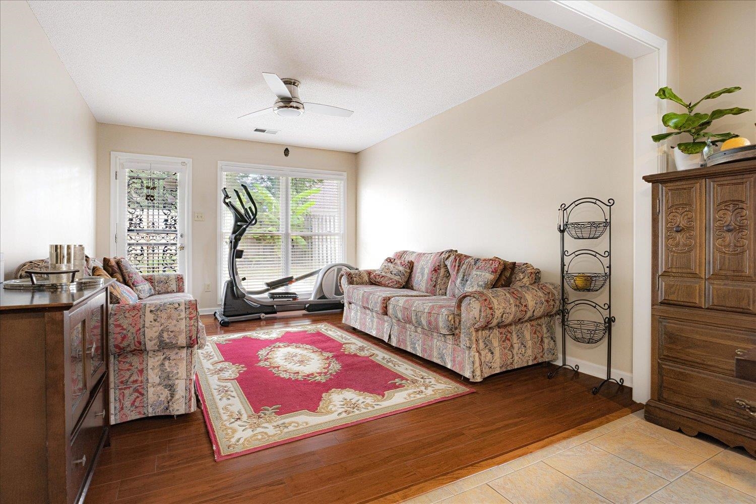 9163 Roundabout Lane Memphis, TN 38018 - Photo 6 of 24 Living area featuring a ceiling fan and wood finished floors