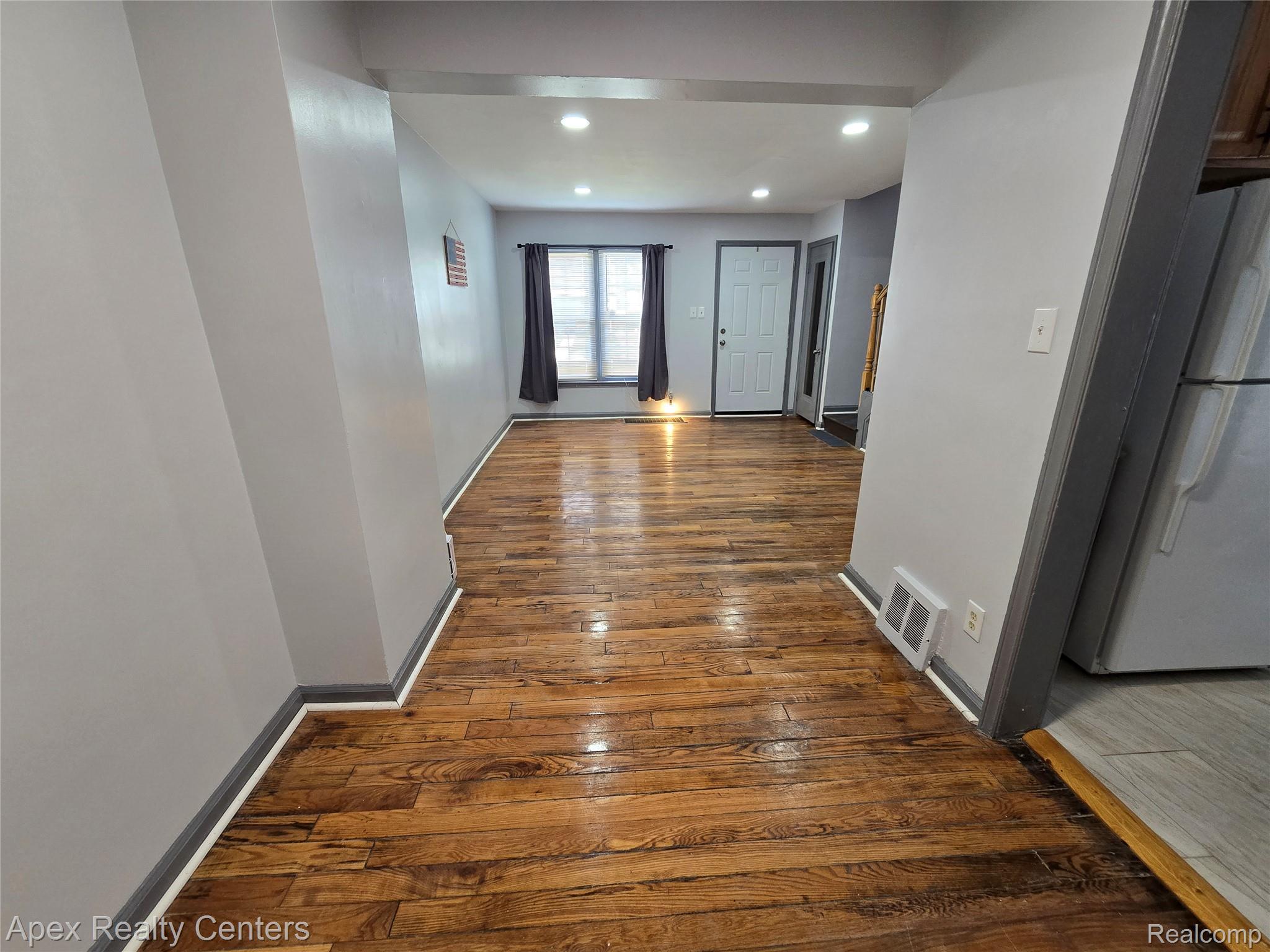 7671-7675 Evergreen Road Detroit, MI 48228 - Photo 25 of 84 7671 Evergreen. Hardwood flooring extending throughout the main living space