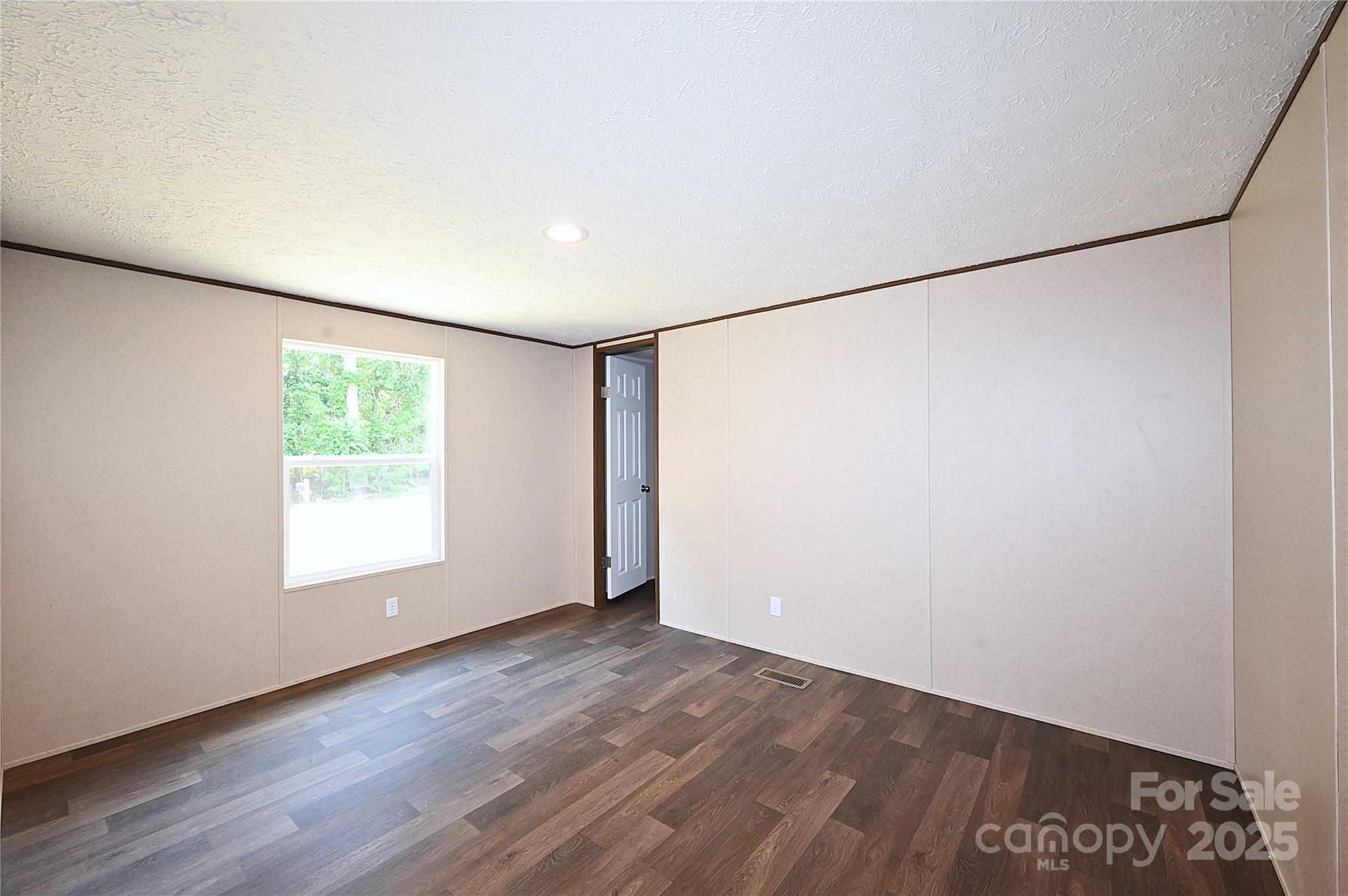 1187 Renno Road Clinton, SC 29325 - Photo 12 of 14 a view of an empty room with a window