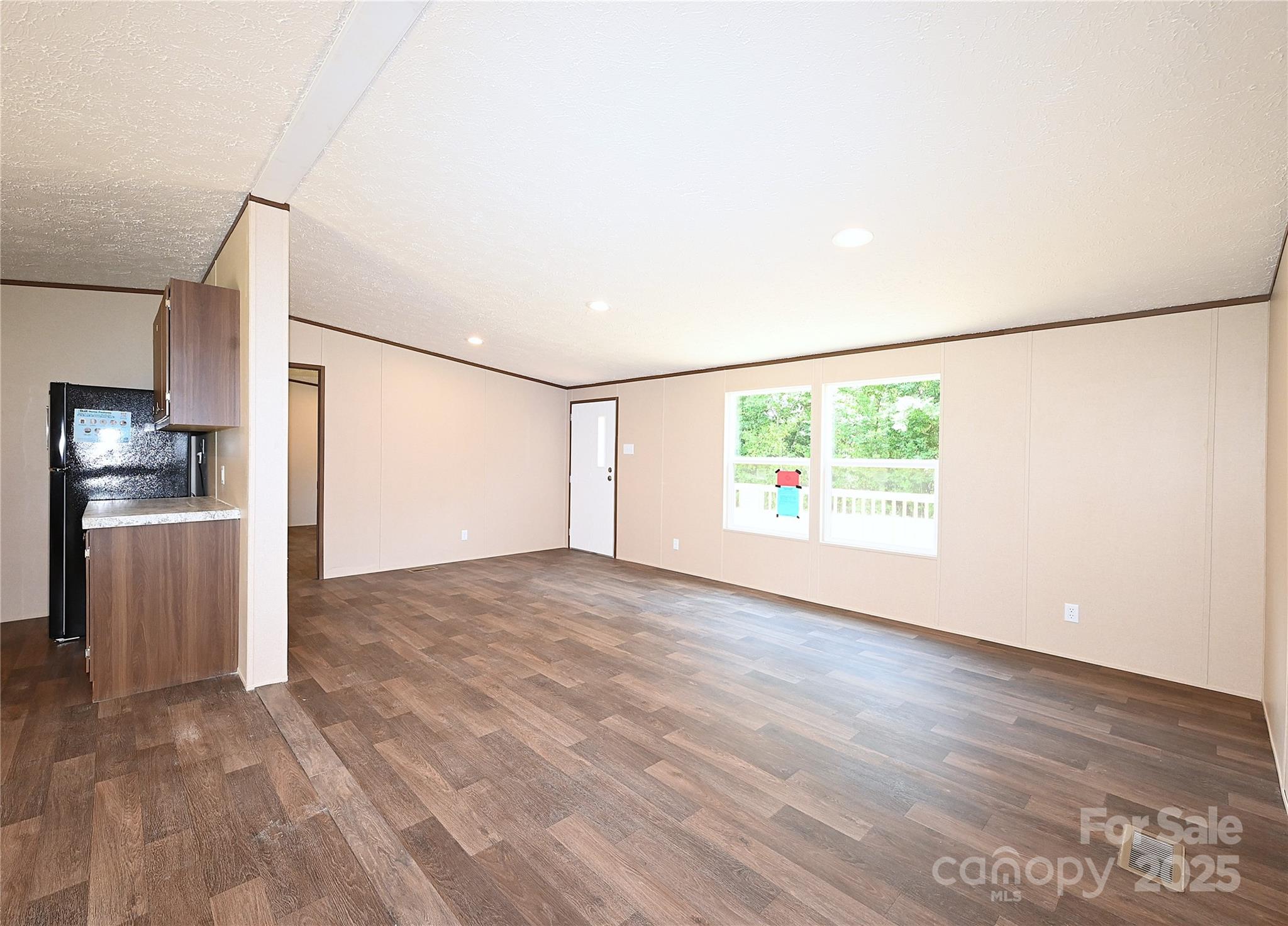 1187 Renno Road Clinton, SC 29325 - Photo 4 of 14 a view of an empty room with a window