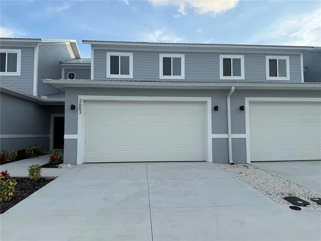 a view of a house with many windows