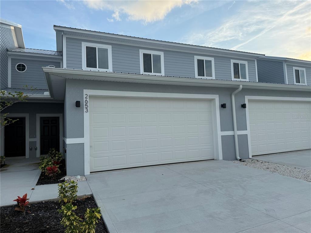 2653 Pine Place Winter Haven, FL 33881 - Photo 2 of 33 a house view with a outdoor space