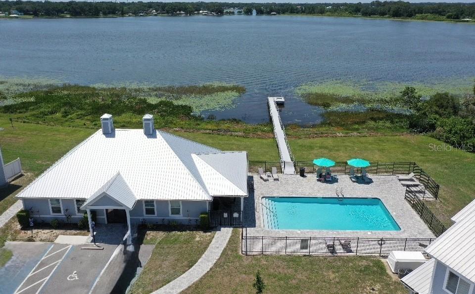 2653 Pine Place Winter Haven, FL 33881 - Photo 32 of 33 a view of a house with a yard and pool