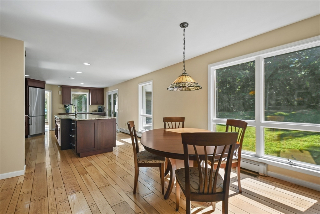 55 Prospect Hill Road Harvard, MA 01451 - Photo 12 of 42 a view of a dining room with furniture window and wooden floor