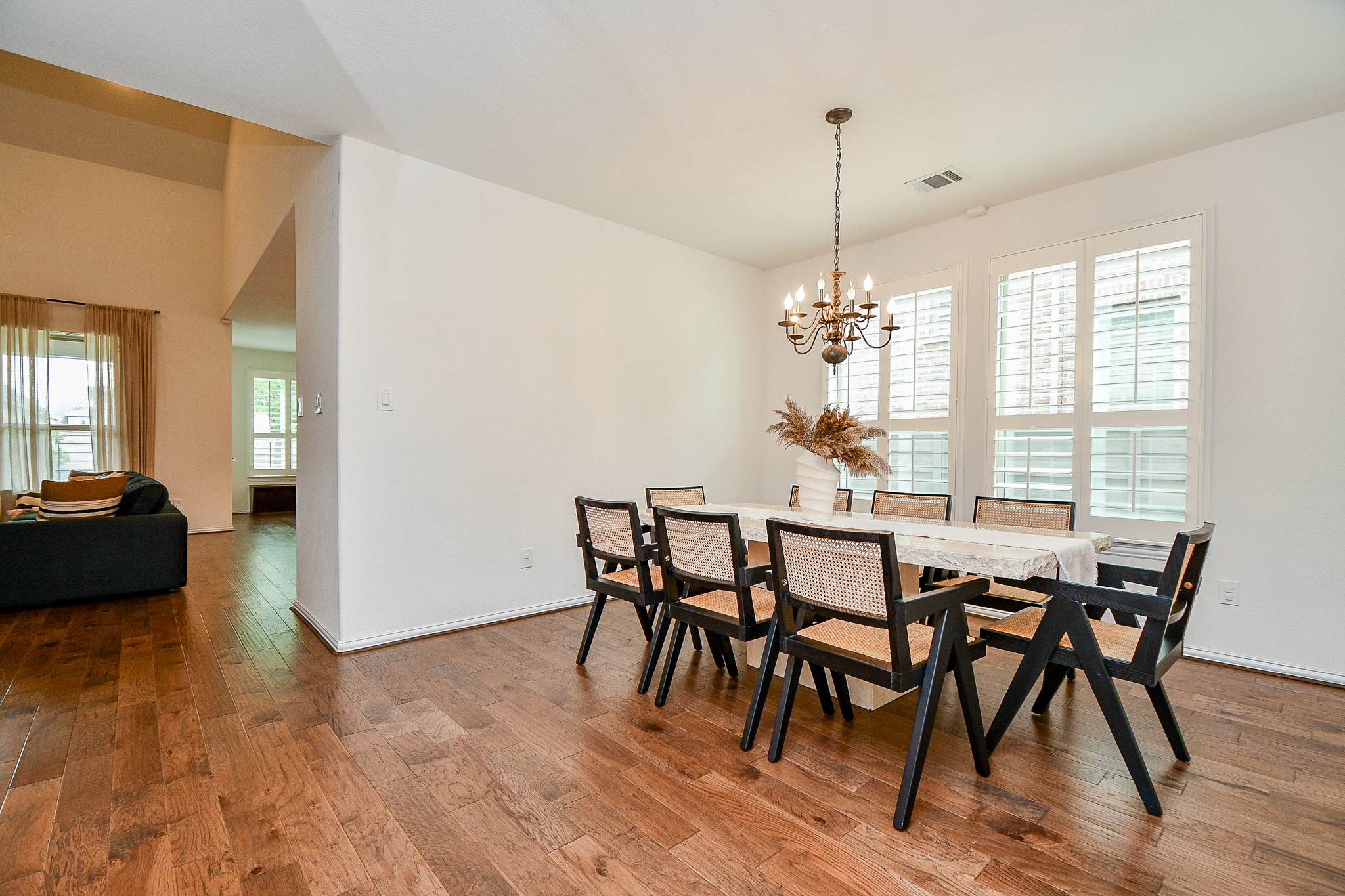 4523 Juniper Ridge Lane Manvel, TX 77578 - Photo 11 of 38 a view of a dining room with furniture window and wooden floor