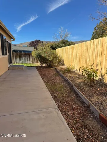 a view of a back yard of the house