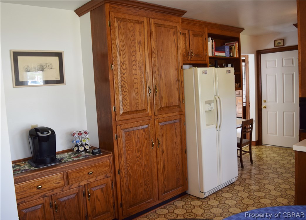 2907 Decatur Drive Hayes, VA 23072 - Photo 10 of 27 The built-in pantry provides lots of extra storage space. Enjoy the coffee bar!