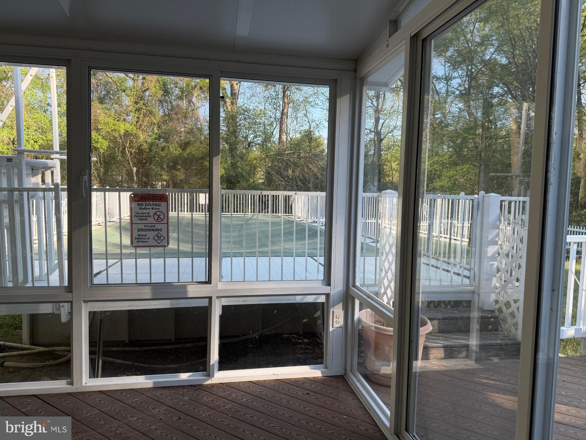 7392 Todds Wharf Road Preston, MD 21655 - Photo 4 of 9 Sunroom looking toward the pool