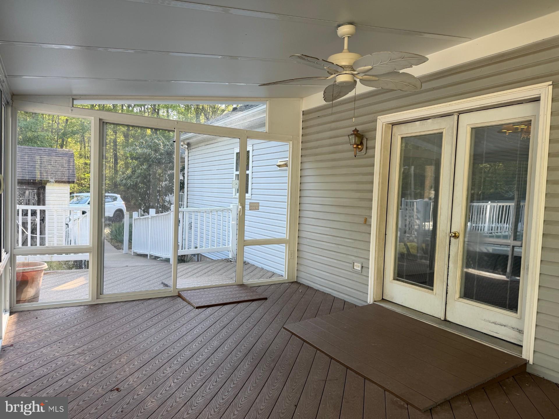 7392 Todds Wharf Road Preston, MD 21655 - Photo 5 of 9 Large sunroom from dining room