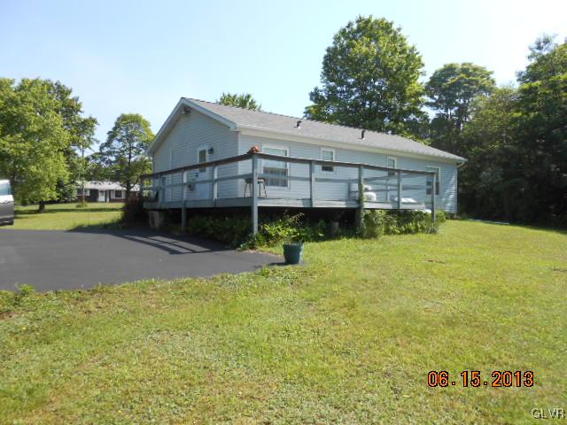 124 Rolling View Road Palmerton, PA 18071 - Photo 11 of 15 a view of a house with pool and a yard