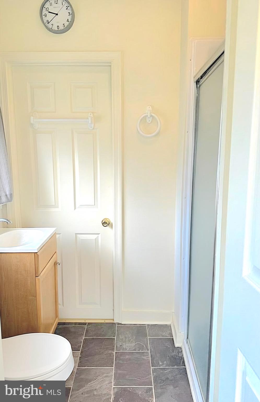 405 Leonards Lane Cambridge, MD 21613 - Photo 18 of 33 a bathroom with a toilet and a shower