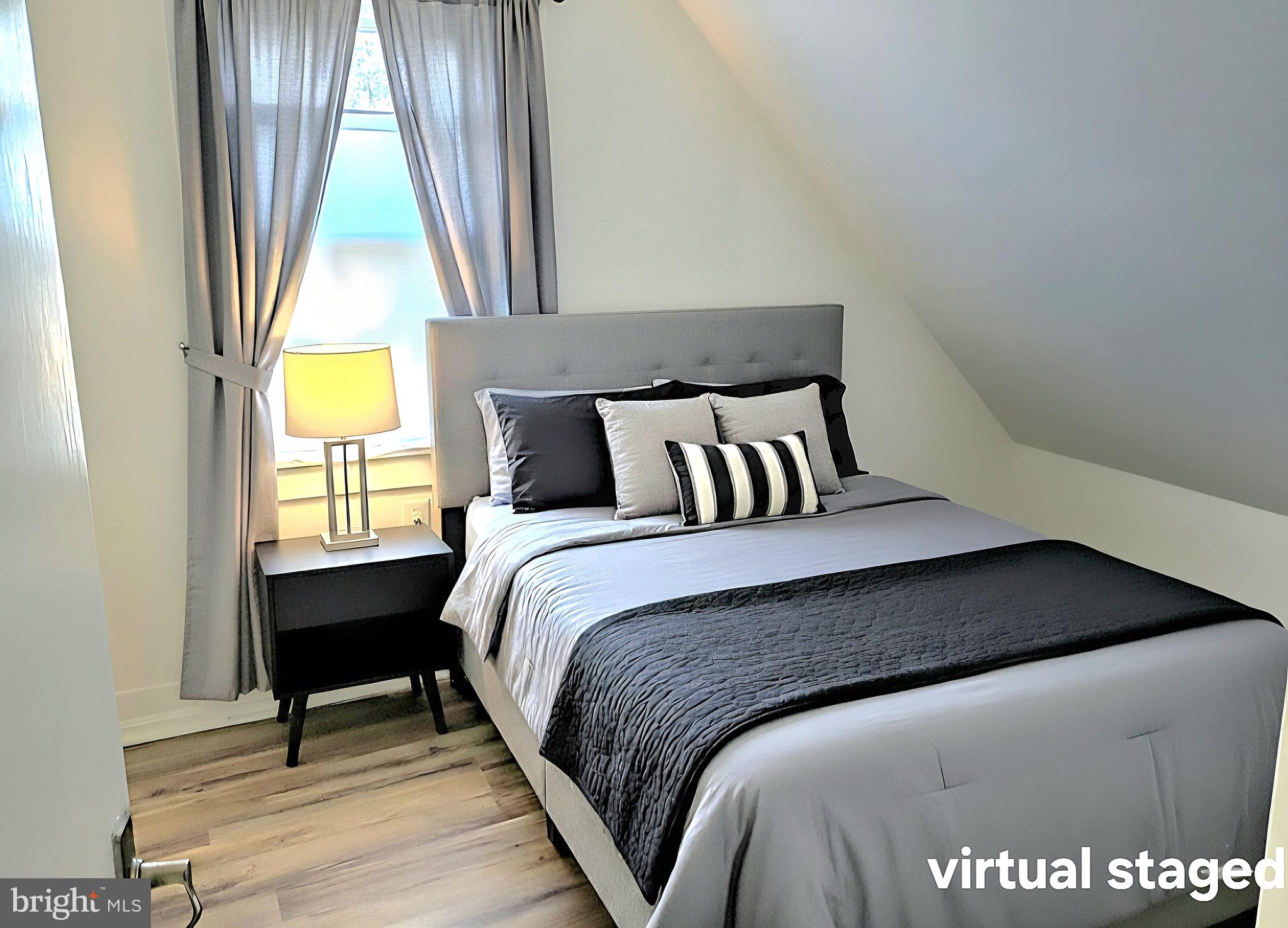 405 Leonards Lane Cambridge, MD 21613 - Photo 26 of 33 a bedroom with a bed and a window