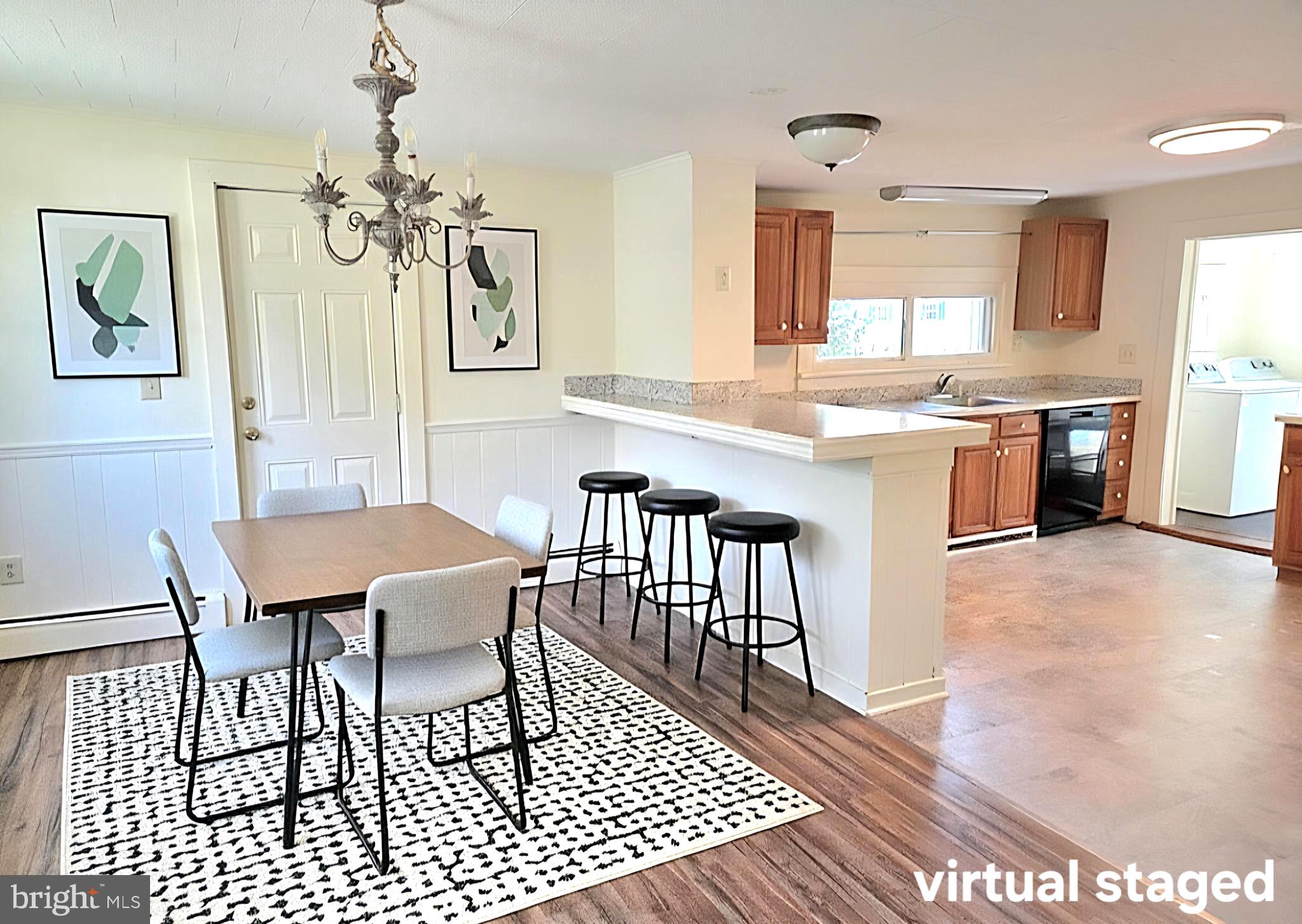 405 Leonards Lane Cambridge, MD 21613 - Photo 4 of 33 a view of a dining room with furniture