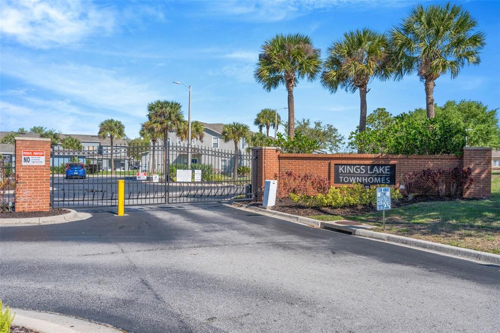 6765 Lake Rochester Lane Gibsonton, FL 33534 - Photo 29 of 33 a view of a street with a tree on the side of the road