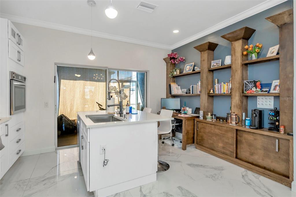 6765 Lake Rochester Lane Gibsonton, FL 33534 - Photo 9 of 33 a view of kitchen and sink