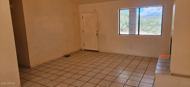 a bathroom with a sink and a window