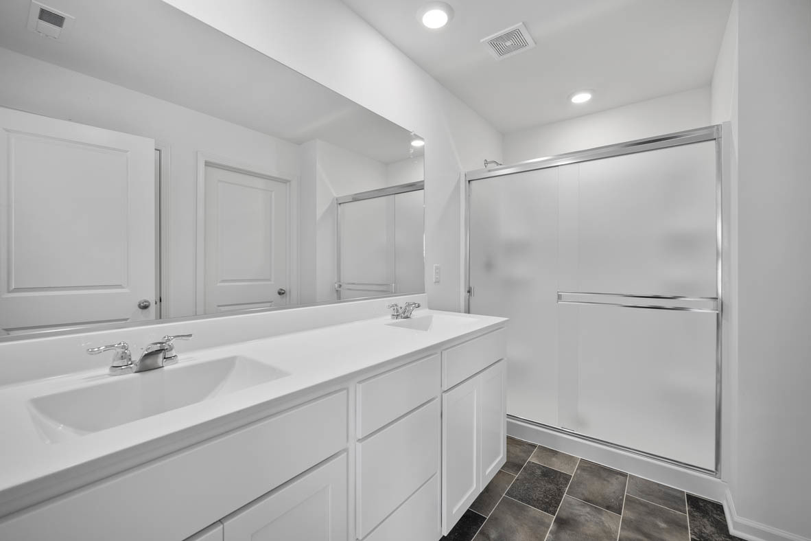 2461 Tahoe Lane Pingree Grove, IL 60140 - Photo 11 of 34 a bathroom with a sink and a mirror
