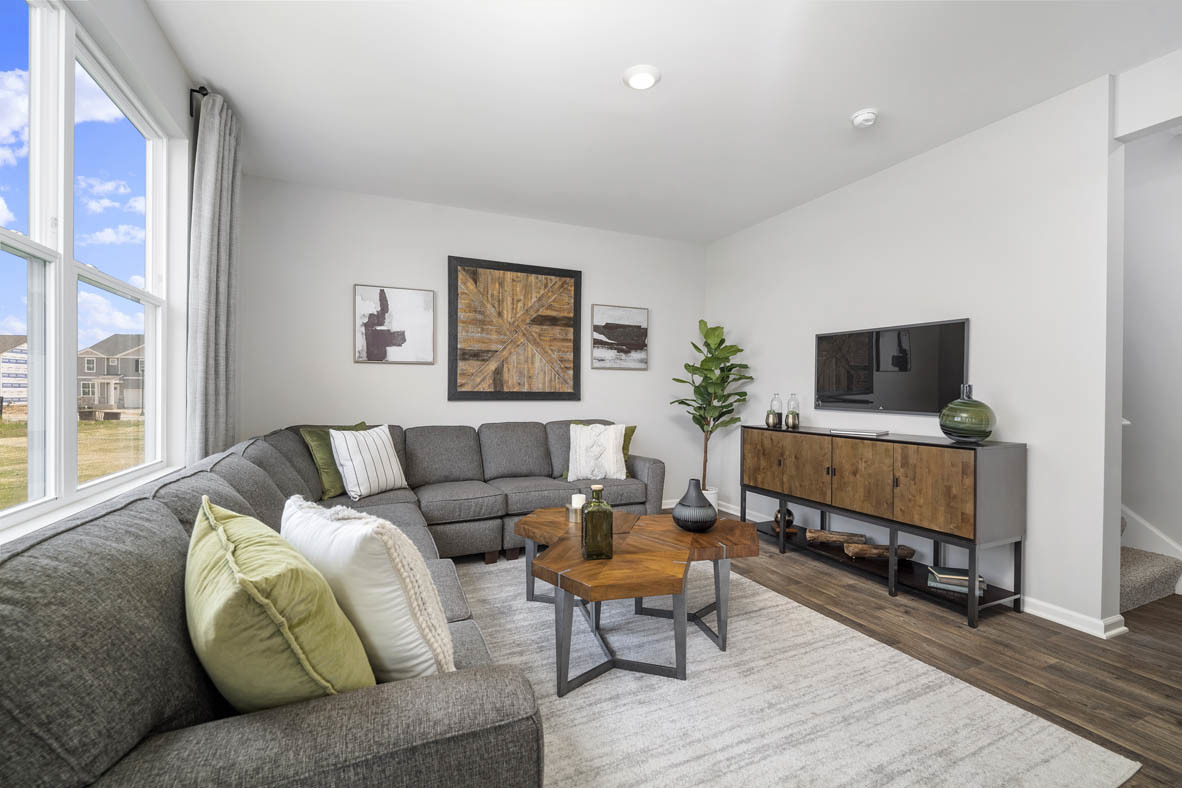 2461 Tahoe Lane Pingree Grove, IL 60140 - Photo 18 of 34 a living room with furniture and a flat screen tv