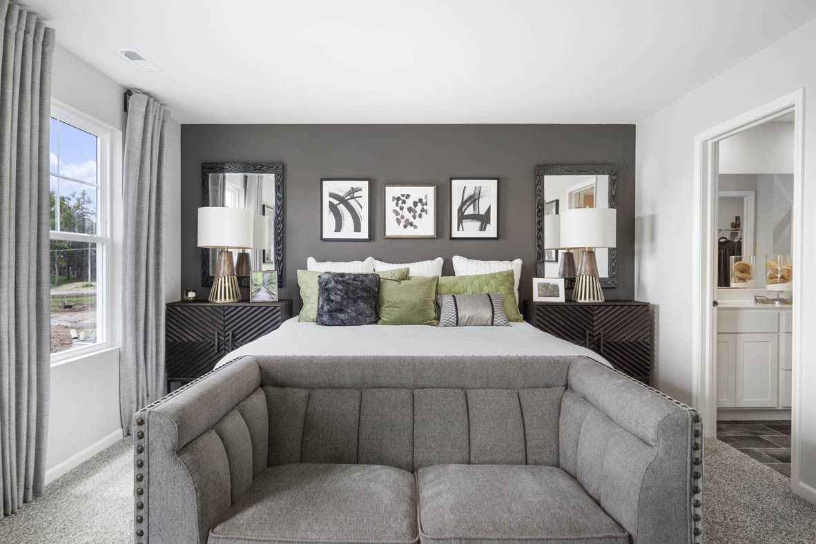 2461 Tahoe Lane Pingree Grove, IL 60140 - Photo 28 of 34 a bedroom with a bed and a large mirror