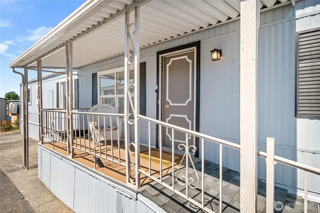 a view of balcony with a potted plant