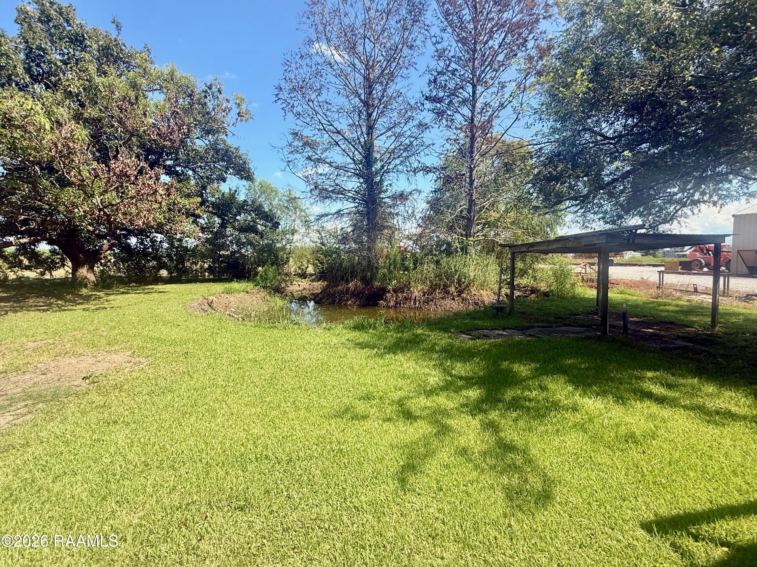 6718 Gondron Road New Iberia, LA 70563 - Photo 22 of 50 yard/pond