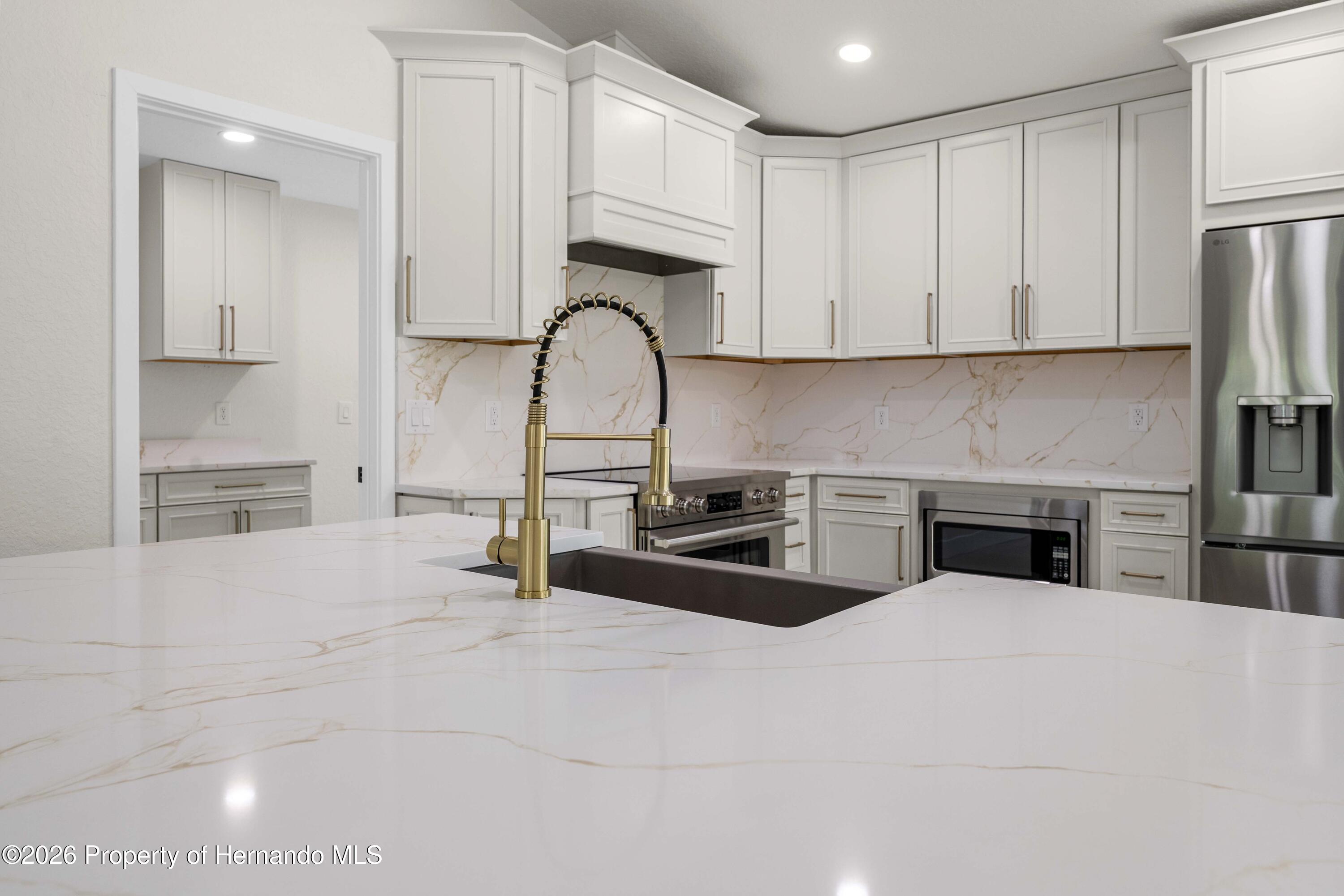 9086 Grove Road Spring Hill, FL 34613 - Photo 8 of 32