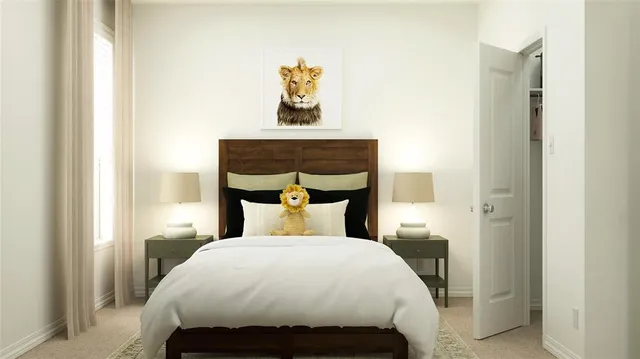 a bedroom with a bed and painting on the wall