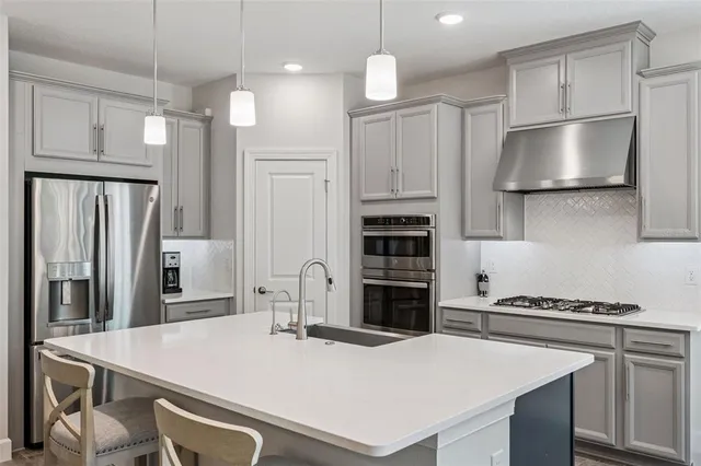 a bedroom with bed and window