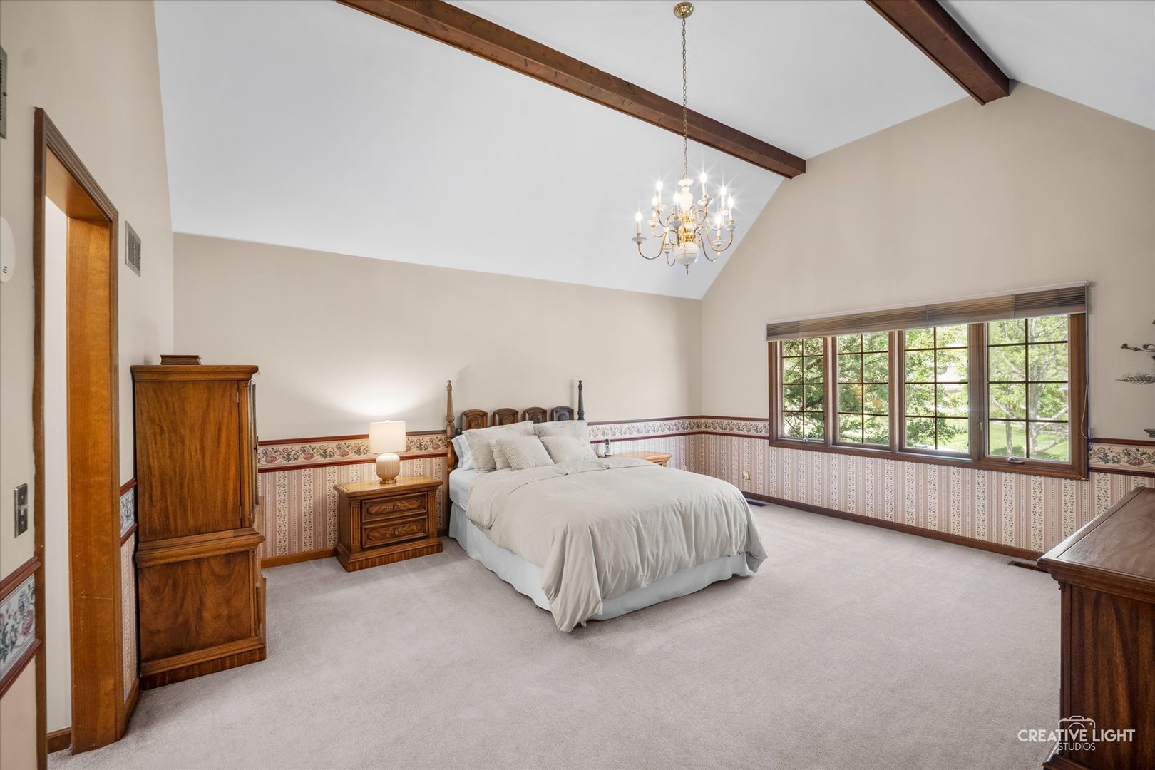 3112 Turnberry Road St. Charles, IL 60174 - Photo 21 of 43 a bed room with a bed and a large window