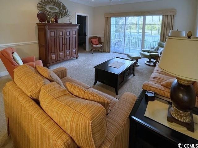 1008 Ray Costin Way, Unit 310 Murrells Inlet, SC 29576 - Photo 20 of 40 Living area featuring carpet flooring